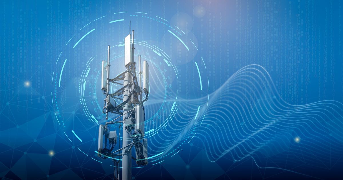 How to ensure reliable global IoT coverage. Blue background with telecom tower and light-lines illustrating radio waves.